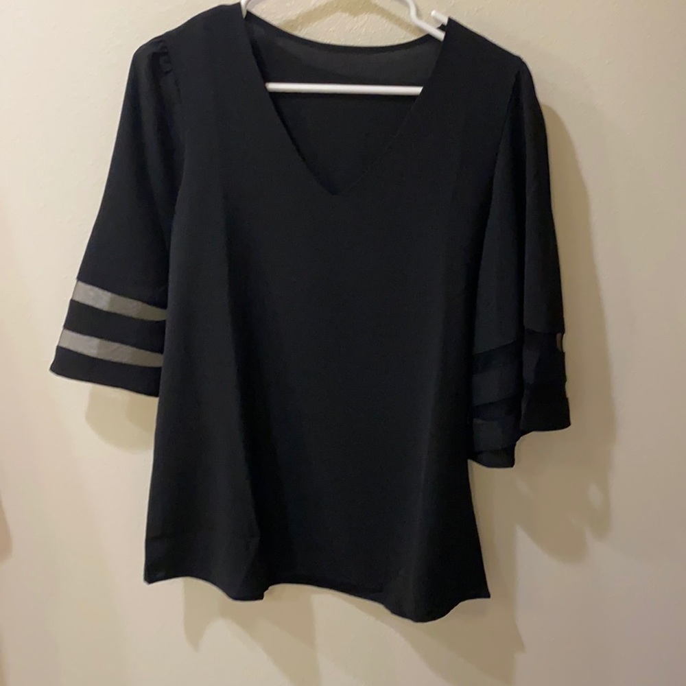Black blouse with mesh detail